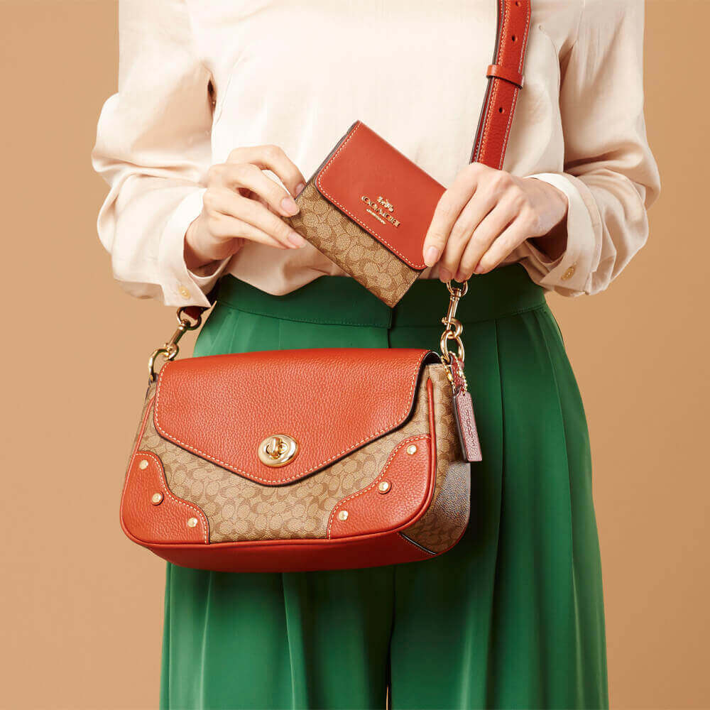 COACH復古小C LOGO馬鞍兩用包 