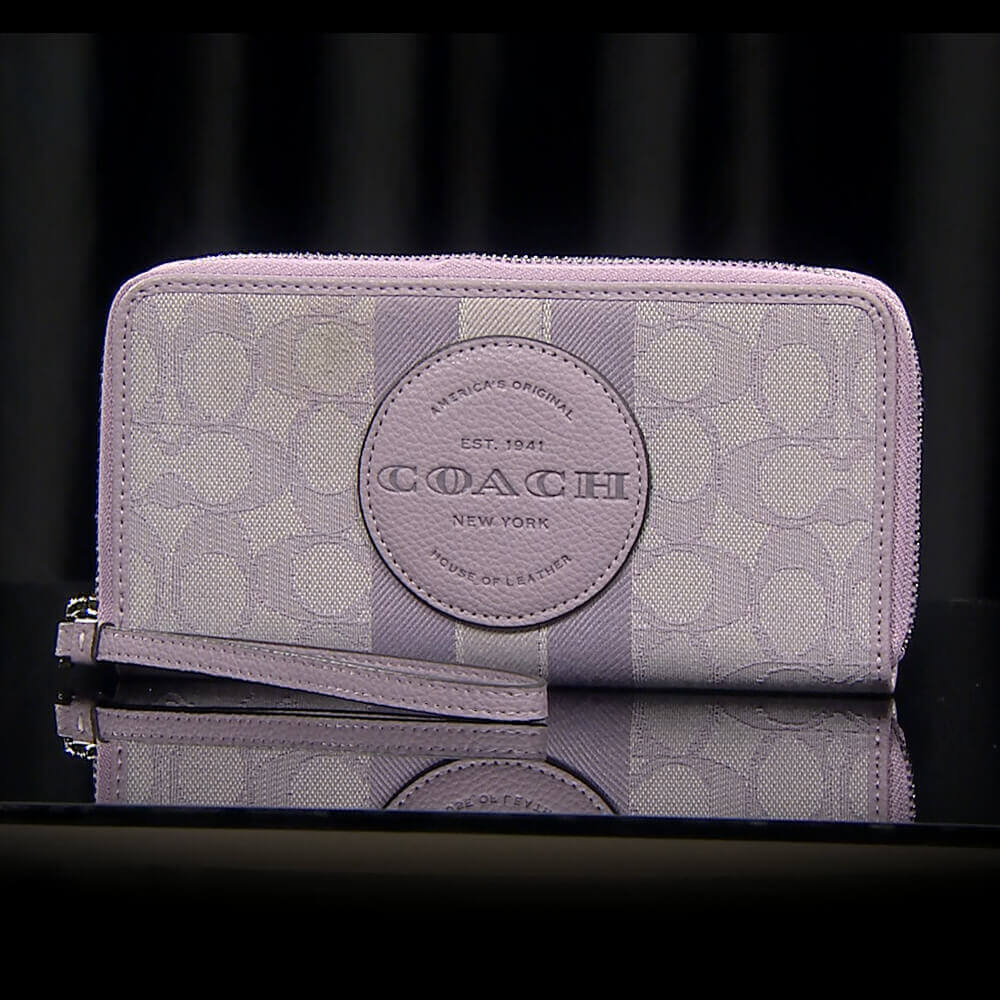 COACH手挽緹花牛皮長夾